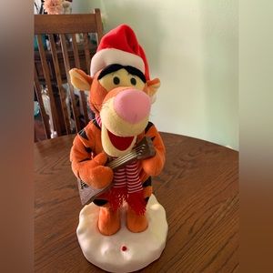 Animated Tigger with Guitar Singing “ Santa Claus Is Coming To Town”